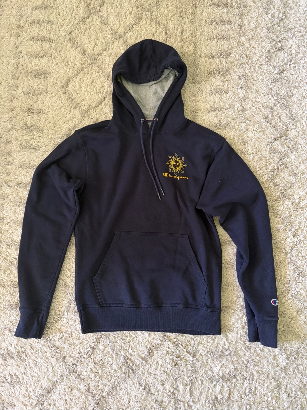 champion navy hoodie with sun design